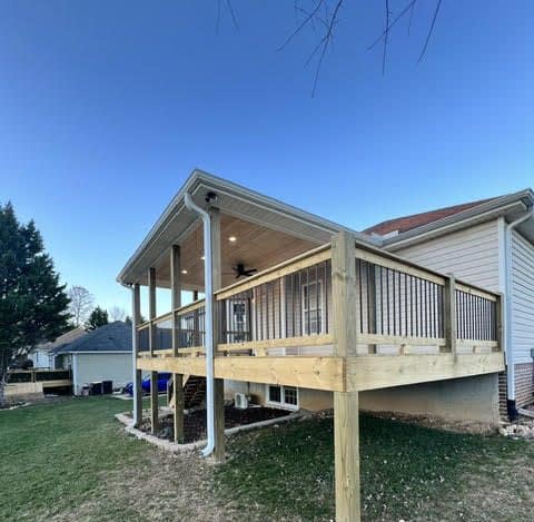 Covered deck with custom siding built by Arellano Construction